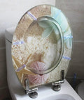 Thick Resin European Style Toilet Seat Lid With Slick Slow Close Hinge Quick No Sweat Setup Totally Waterproof Skin Safe Premium Heavy Duty Finish For Universal Bathroom Glow Up shown in a beach theme with seashells.