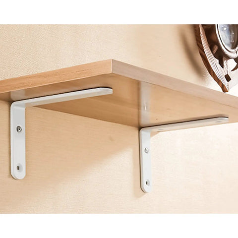 Solid As A Rock Heavy Duty Wall Mounted Shelf Brackets For Clean Floating Planks With Gritty Industrial Look And No Sweat Setup For Impressive Home Organization Hacks Set Of Two Bright White installed under a wooden shelf.