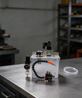 Heavy Duty Cnc Mist Coolant System With 3L Oil Mist Spray Pump For Machine Tools And Workshop Lubrication Featuring Solenoid Valve And Shoots Like A Dream, clear plastic casing and visible components.