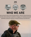 Ballistic Rated Safety Glasses Featuring Matte Graphite Grey Frame And Tungsten Mirror Lenses worn by man in tactical outfit.