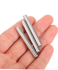 100 Pcs Stainless Steel Cylindrical Dowel Pins For Machinery, Automotive, And Electronics shown in hand for scale.