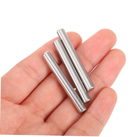 100 Pcs Stainless Steel Cylindrical Dowel Pins For Machinery, Automotive, And Electronics shown in hand for scale.