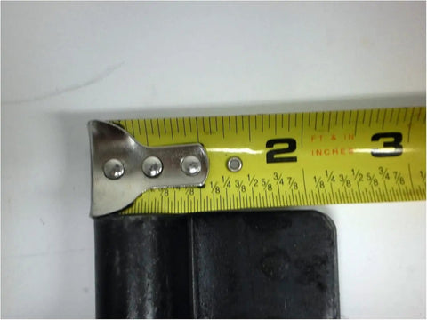 Beefed Up Weld On Butterfly Ramp Hinge With Grease Fitting For Cargo Trailer Doors shown with tape measure, 1000 lb capacity, black raw steel finish.