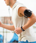 Man jogging wearing Anti Static Wrist Strap With Red Light Indicator For ESD Protection and static electricity removal