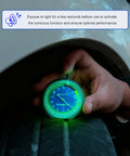 Mechanic using 32nds Tire Tread Depth Gauge With Glow In The Dark Luminescent Dial And Storage Bag For Cars Trucks And Motorcycles Pro Grade Thread Depth Gauge For Easy On The Job Readouts With Ultra Accurate Clear Readouts For Pro Mechanics on a tire.