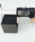 Caliper measuring 99.9% Purity Graphite Ingot Block For EDM And Milling Surfaces 50x50x50mm With Tight 0-0.05mm Tolerance.