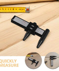 2pcs ABS Wheel Bolt Spacing Tool for Wheel Hub Precision Measurement placed on wood for accurate measurement.