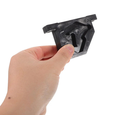 Heavy Duty Tire Changer Machine Part Metal Connecting Rod Slider For Quick Tire Swaps And Easy Tire Changes Durable Replacement Component For Car And Motorcycle Tires Built To Handle Tough Jobs. black plastic slider held in hand