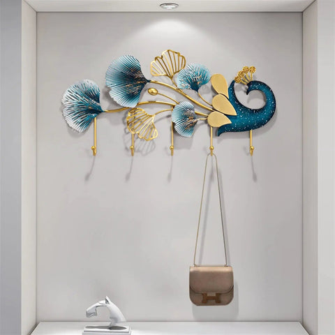 Sleek Wall Mounted Coat Rack With Extended Hook Arms For Entryway, modern design with decorative leaves and bag hanging.
