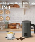 4 In 1 Milk Frother And Warmer With Stainless Steel Build And Touch Screen on a kitchen counter near coffee beans and latte