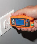 RT250 GFCI Outlet Tester with LCD Display for 120V Receptacles testing an outlet, backlit readout showing 120V.