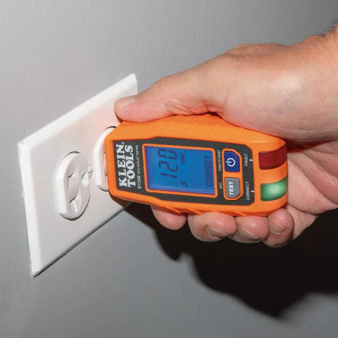 RT250 GFCI Outlet Tester with LCD Display for 120V Receptacles testing an outlet, backlit readout showing 120V.