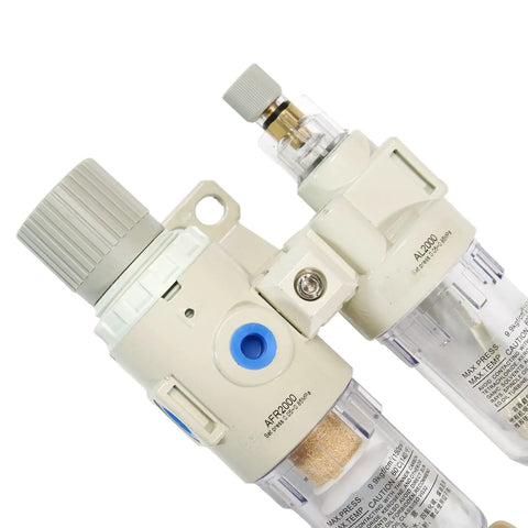 Close-up of One Quarter Inch NPT Air Filter Regulator Lubricator Combo with pneumatic air dryer and semi-auto drain