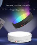 CHANGLKJ Led Rotating Turntable Display Stand With Remote Control 5000 Mah Battery showcasing vibrant LED colors in black and white.