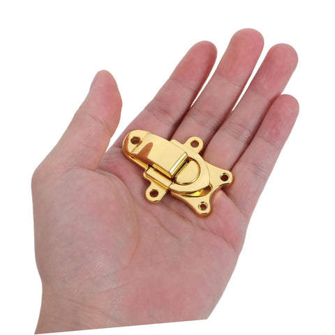 Chic 2pcs Retro Golden Duckbill Toggle Latches Fit Any Wooden Chest Or Toolbox With Stunning Zinc Alloy Finish For Vintage Decor And Secure Fastening, small gold latch in hand