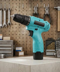 Built Tough 12V Cordless Drill With 25 Plus 1 Torque Settings And Dual Speed Modes on workbench with tools in background.