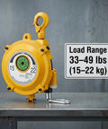 Spring Balancer 33-49 Lbs Tool Balancer With Adjustable Retractable Holder on metal table, yellow heavy-duty steel housing