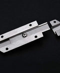 Rock Solid Sliding Bolt Door Lock With Smooth Auto Glide And Flat Barrel Profile For Patios Barn Doors And Gates Super Easy Surface Mount Security Hardware In Matte Silver Finish parts on black background.