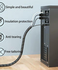 Spiral Cable Wrap 1/2 Inch Black, 23 Ft Long Wire Organizer for cable management on computer setup showing flexibility and protection.