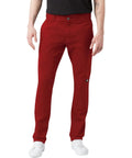 Men's Skinny Straight Double Knee Work Pants With Heavy Duty Reinforcement, Wrinkle Resistant Fabric, And A Stain Release Finish That Looks Sharp On The Job Site All Day In English Red shown on model with black shirt.