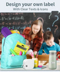 Compact Bluetooth Label Maker With Tape And Templates shown with a teal backpack, school supplies, and classroom background.