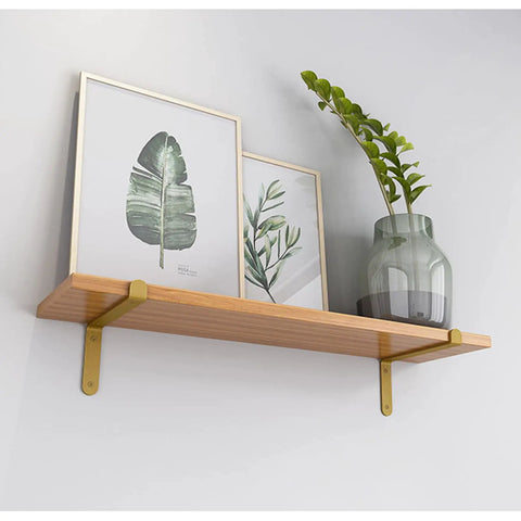 Premium Corner Shelf Brackets For Floating Wall Shelves and Rustic Industrial L Shape Supports with a Sleek Matte Black Finish holding framed art.
