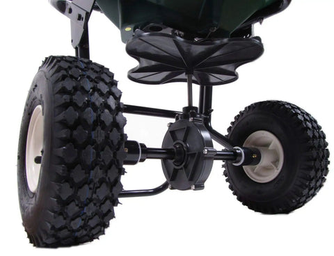 Close-up of durable tires on 50Lb Push Spreader With Enclosed Gearbox And Powder Coated Steel Frame, Walk Behind