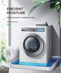 Washing machine on a blue mat beside a white towel and plant in a bright room with text about moisture prevention.