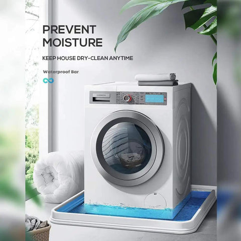Washing machine on a blue mat beside a white towel and plant in a bright room with text about moisture prevention.