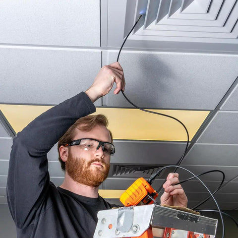 Person using Rugged Utility Borescope Endoscope Camera With 9.8 Ft Waterproof Gooseneck 5.5 mm Insertion Tube Bright LEDs in ceiling vent