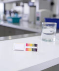 80 Pack Litmus Paper Strips pH Test Strips 1 To 14 For Saliva Urine Water Soil Pet Food And Diet Testing on lab counter