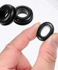 Hand holding 1/2 inch inner diameter rubber grommet from Durable Rubber Wiring Hole Grommets 30 Pack For Wires Cables And Hoses