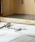 Six Pack 360 Degree Concealed Door Pivot Hinges For Wood Cabinets displayed with screws in front of wooden cabinet.