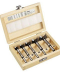 Pro Grade Carbide Tipped Forstner Drill Bit Kit featuring five smooth cutting heads sized 15 to 35 mm in a wooden case.