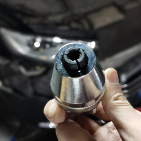 Close-up of the Damaged Bolt And Stud Extractor Tool For One Quarter Inch To One Half Inch Studs That Grips and removes bolts