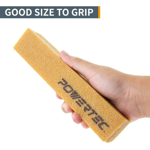 Hand holding Abrasive Cleaning Stick For Sanding Belts And Discs Eight And A Half Inches Natural Rubber Eraser