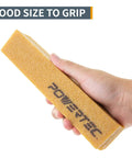 Hand holding Two Pack Eight And A Half Inch Abrasive Cleaning Stick For Sanding Belts And Discs Natural Rubber Eraser