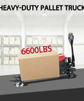 Heavy Duty Electric Pallet Jack 6600 Lb Capacity Warehouse Material Handler transporting a large cardboard box indoors.