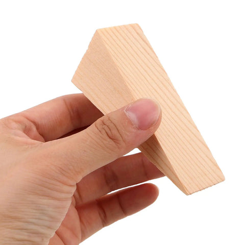 Hand holding a piece from 20Pcs Wooden Door Stop Wedges Set, Triangle Shaped Door Stoppers For Home And Office, Durable Wall Protectors