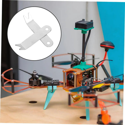 Five Piece Quadcopter Prop Removal Tool Kit For Hexacopters And Drones Easy Disassembly And Maintenance Durable Aircraft Repair Gear For Quick Prop Fix And Fast Installation shown next to a hexacopter.