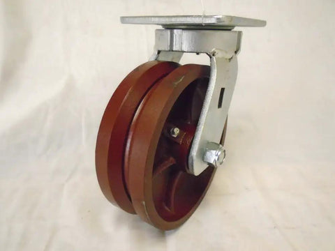 Pro Level Heavy Duty Cart Casters Featuring Genuine Kingpinless Design With Six By Two Inch V groove Ductile Steel Wheels viewed from side angle.