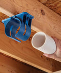 Heavy Duty Dust Hose Support Cradles For 4 Inch Shop Vac Tubing, reinforced blue ABS bracket holding PVC pipe in a workshop.