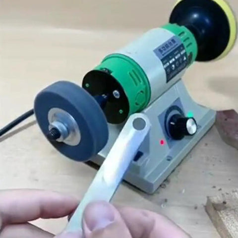 Five Piece Badass Corundum Buffing Wheel Set Featuring Three Inch Polishing Discs With Three Eighth Arbor Hole on a bench grinder.