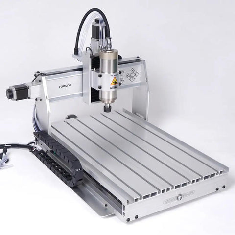 Heavy Duty 3 Axis Cnc Router 6040 Engraving Machine With A Kickass 2200 Watt Spindle And Hg20 Linear Rails On A Sturdy T Slot Table showing the spindle and T-slot table design.