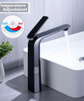 Tall Matte Black And Chrome Bathroom Vessel Sink Faucet With Single Lever One Hole Vanity Tap in use, temperature chart visible.