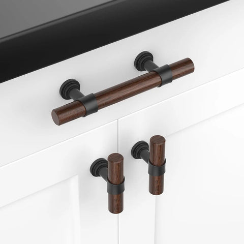 Ten Pack Three Inch Walnut Wood Grain Cabinet Pulls In Matte Black Metal Drawer Handles For Dresser And Cupboard Durable Wood Grain Finish Five Inch Total Length Three Inch Hole Centers For Easy Mounting installed on white cabinet.