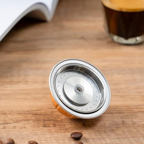 Stainless Steel Reusable Vertuo Capsule For Vertuo Next With Three Brewing Sizes 80 Ml 150 Ml And 230 Ml on wooden table