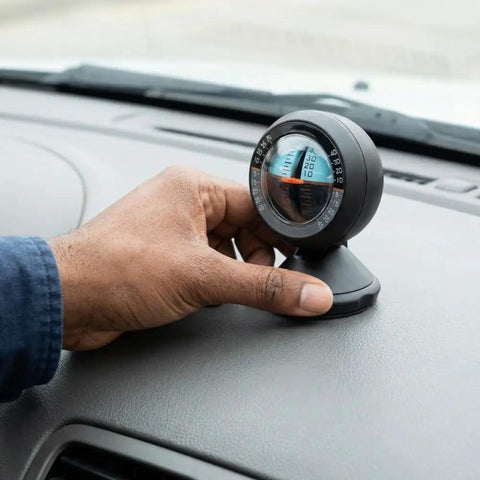 Straight Up Dead On Digital Slope Meter And Vehicle Tilt Gauge equipped with a swiveling display on car dashboard.