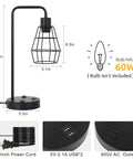 Two Pack Industrial Table Lamps With Dual USB Ports And AC Outlet, black metal cage with USB and outlet details