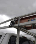 1.5 Inch By 8 Foot Mountable Rack Ratchet Tie Down Straps With 500 Lbs Working Load Limit securing ladder on truck rack